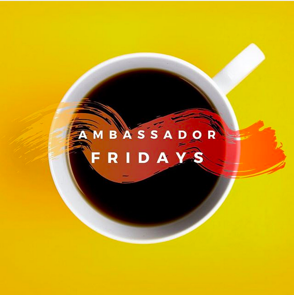 a coffee cup with the text "Ambassador Fridays."