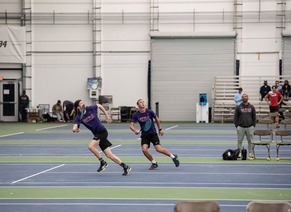 Ben playing tennis