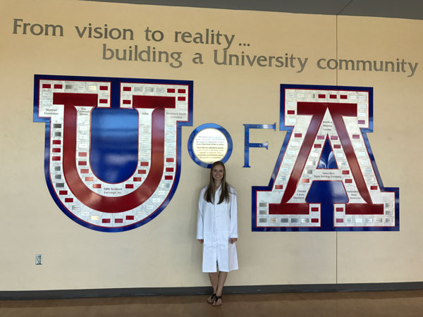 Allison Mason Smith '17 in front of U of A sign