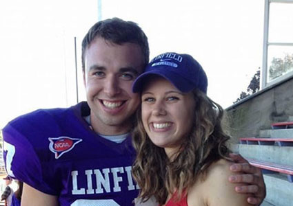 Brenna and Trevor in football uniform after a Wildcat football game in 2013.