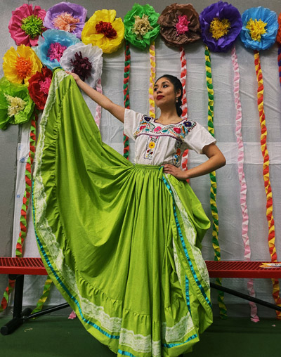 portrait of Cecilia Flores '24 in her folklórico dress