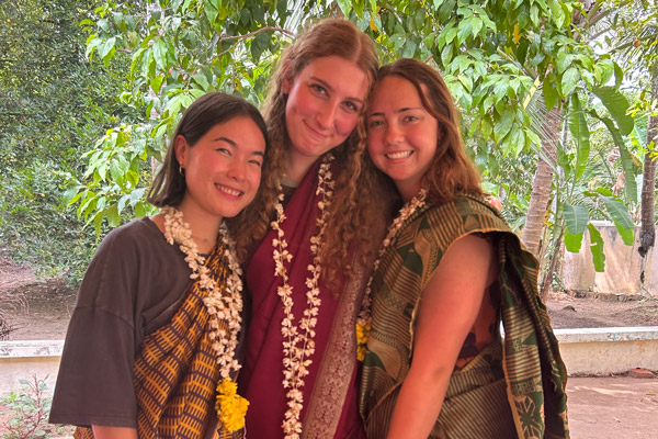 Emma in India with two other Linfield students.