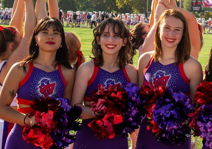 Kayley, Matigan and Olivia performing with the Linfield Dance Team at a Wildcat football game