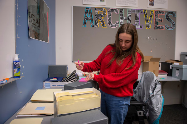 Olivia helping with the archive