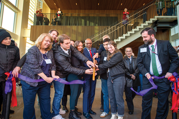 Linfield STEM faculty and students cutting the ribbon on the new science complex.