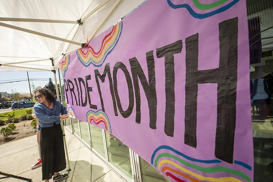 The Pride Month banner at the kickoff event in 2024.