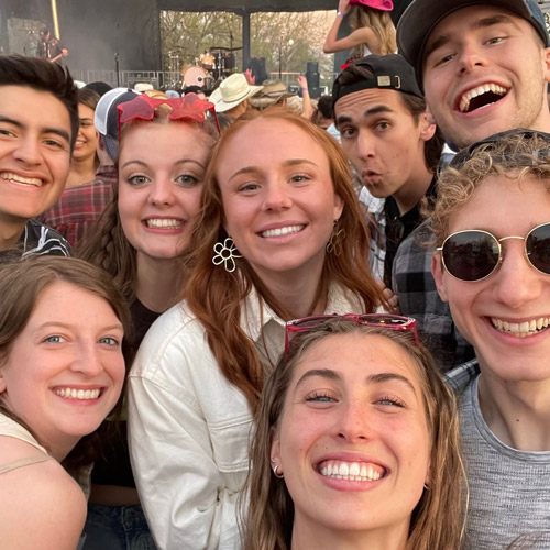 Group of students taking a selfie at the concert.