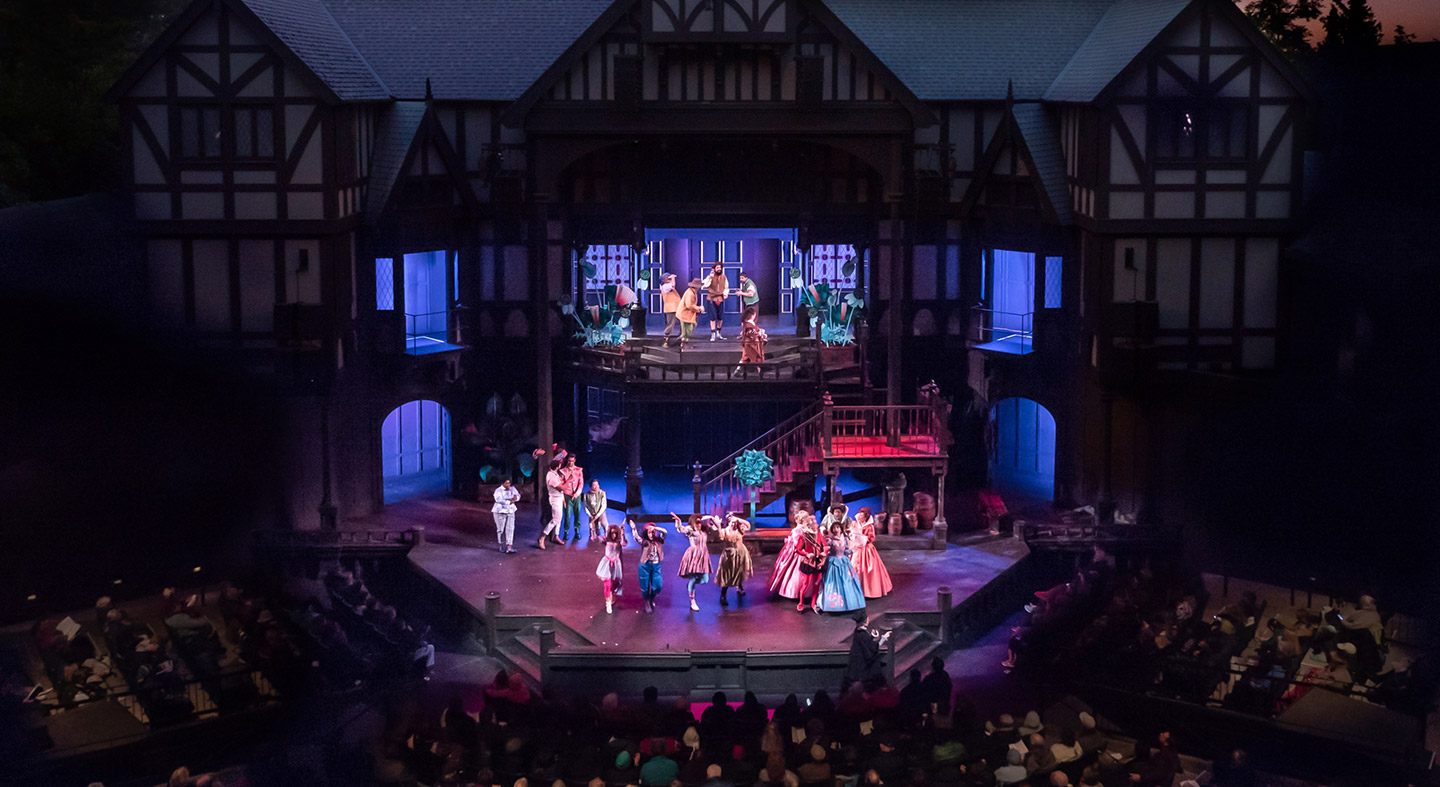 A scene from Merry Wives on the stage at Oregon Shakespeare Festival