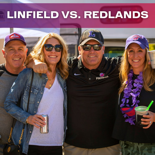 Four Linfield alumni at a pre-game gathering.