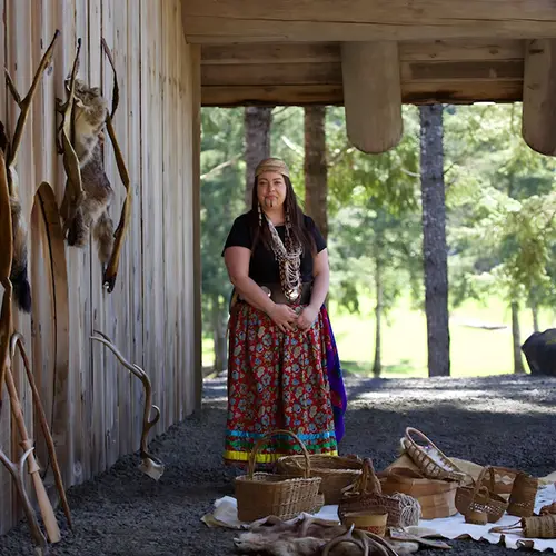 Stephanie Craig posing with some of her pieces.