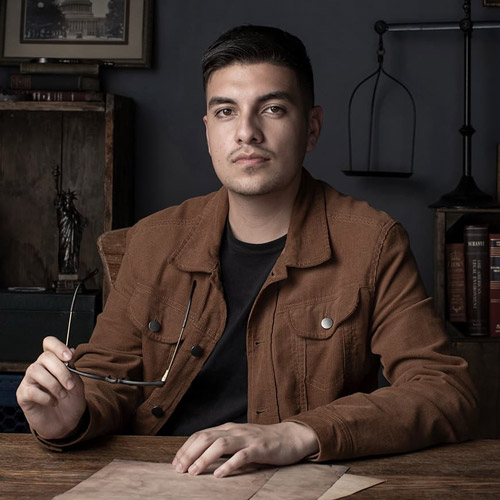 Portrait of Antonio Peña Anaya ’21 sitting at a desk