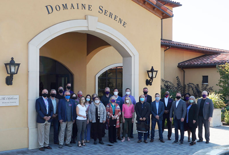a group photo of the Linfield BAC members in front of Domaine Serene winery