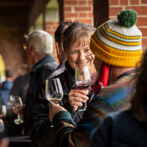 two Oak and Wine members tasting wine.